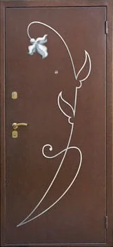 Декоративная отделка из художественной ковки на входной двери (99)