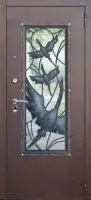 Декоративная отделка из художественной ковки на входной двери (67)